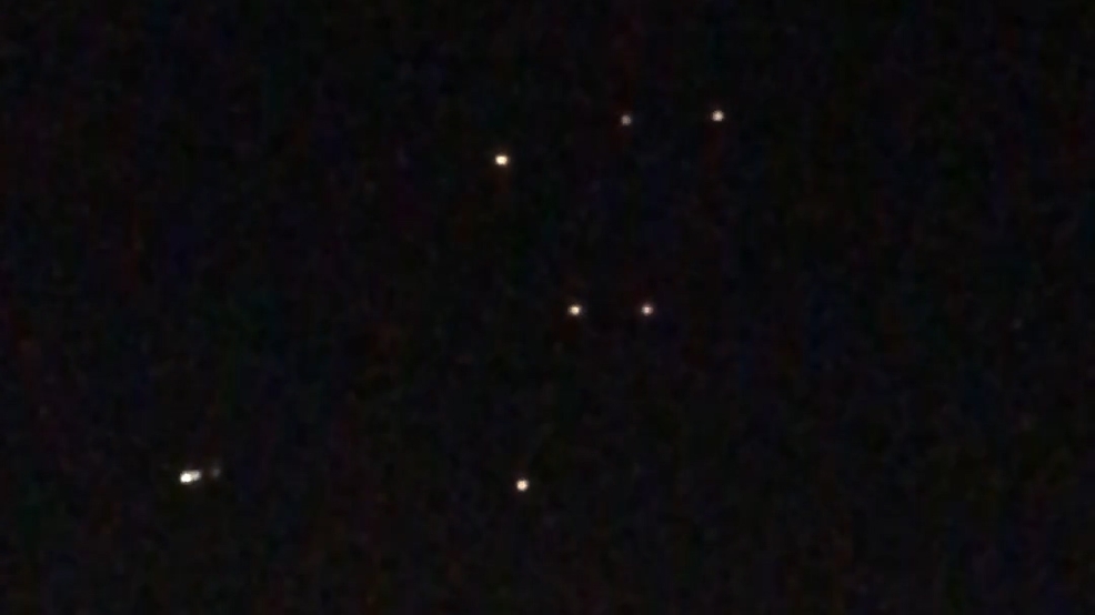 floating lights in the sky