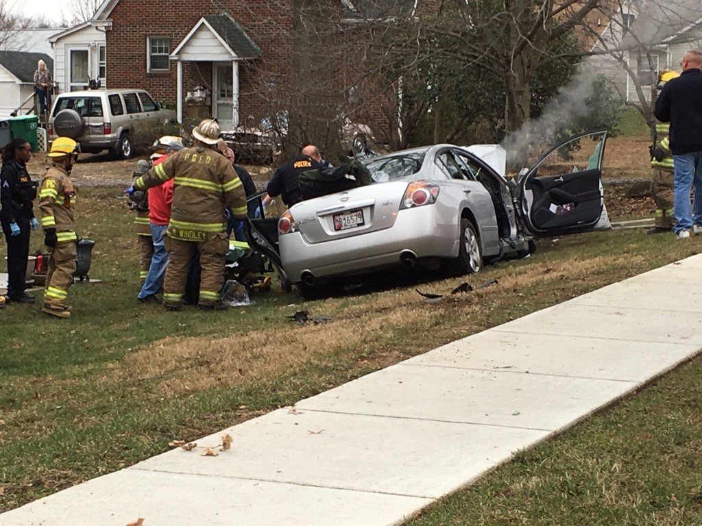 Fire officials Woman dead, 1 injured after car crashes into tree in