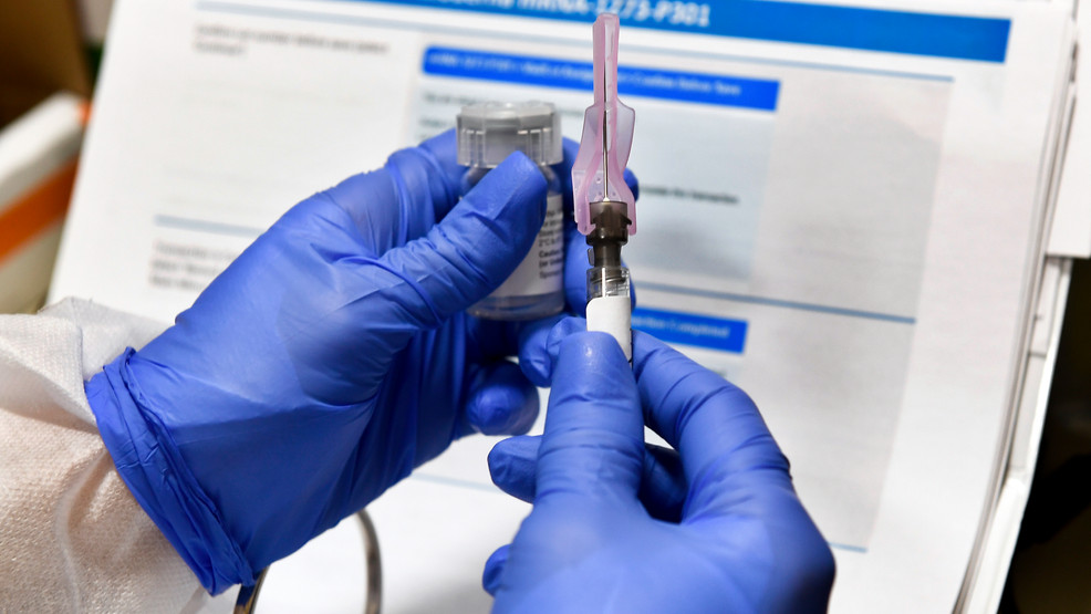 Virus Outbreak-Vaccine Race AP20209499892408.jpg