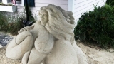 Sand sculpture of busty Cape Cod mermaid draws complaints
